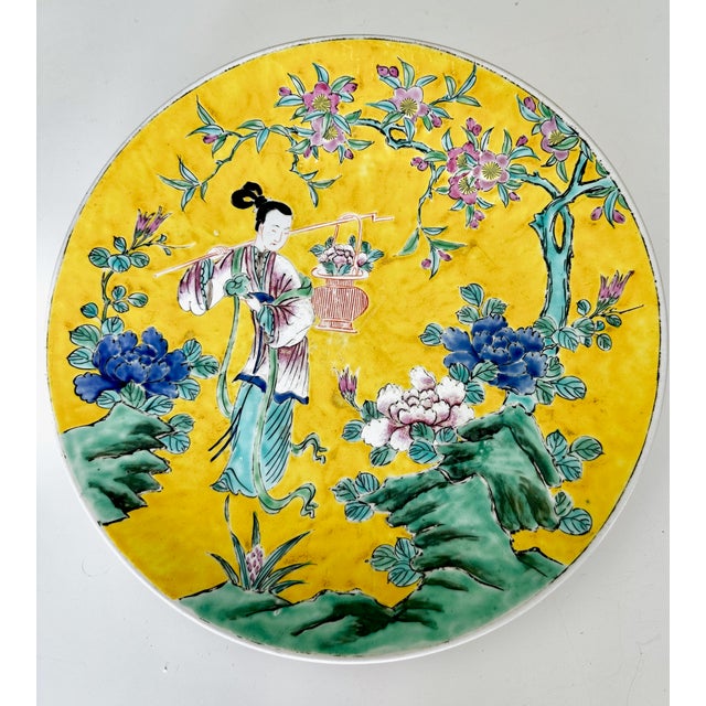 A striking, highly decorative late 19th-century Japanese Arita porcelain charger plate produced by the historic Yamatoku...