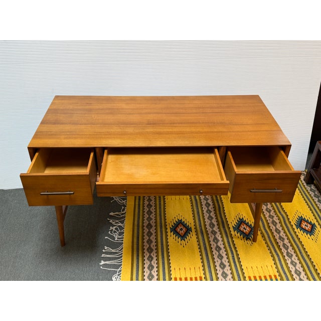 Design Plus Gallery presents the Mid Century Desk from West Elm. The desk showcases a streamlined mid-century inspired...
