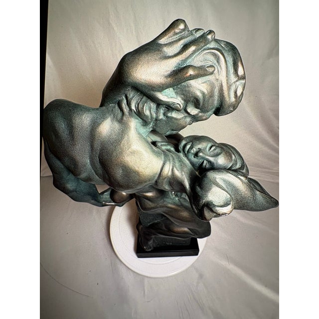 This is a vintage sculpture by Alexander Daniel, produced at Austin Productions in the Art Deco period in 1940. It is...