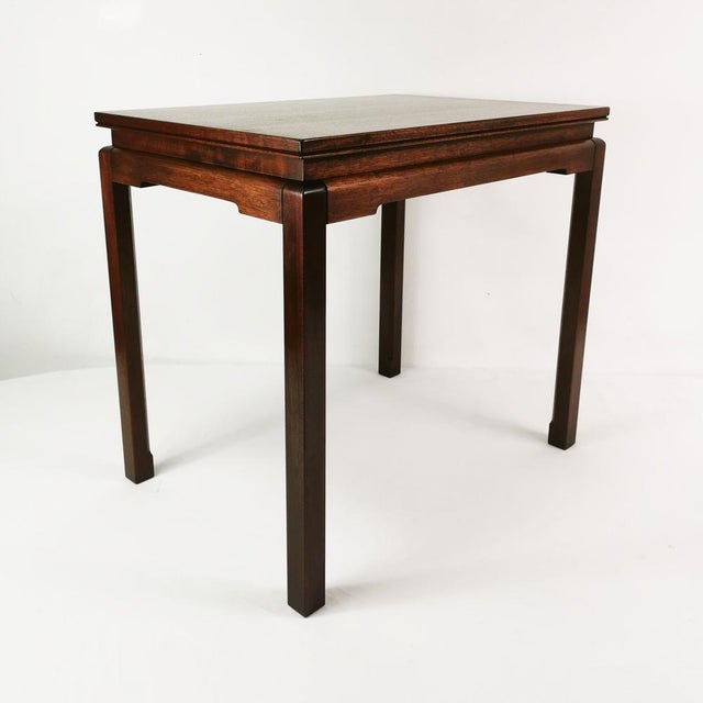 The table originates from Denmark, 1970s. Made of mahogany wood (quite heavy for its size). Classic yet elegant in design,...