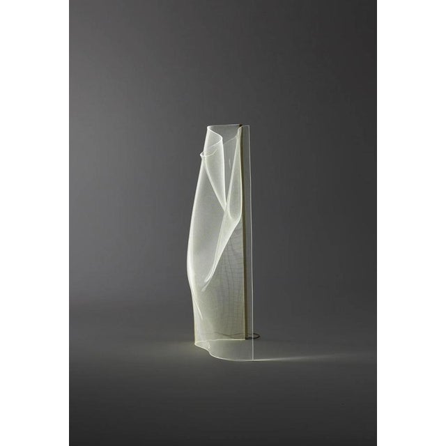 Partisans gweilo han gr golden anodised floor lamp for parachilna this collection is composed of a thermoformed acrylic...