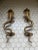 This is a pair of striking Vintaged gold brass cobra door handles with incised decoration in the Hollywood Regency and...