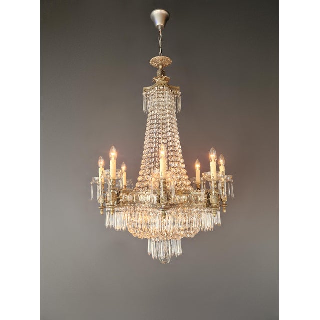 This exceptional crystal chandelier, dating to around 1930, has been fully restored in our Berlin workshop with great care...