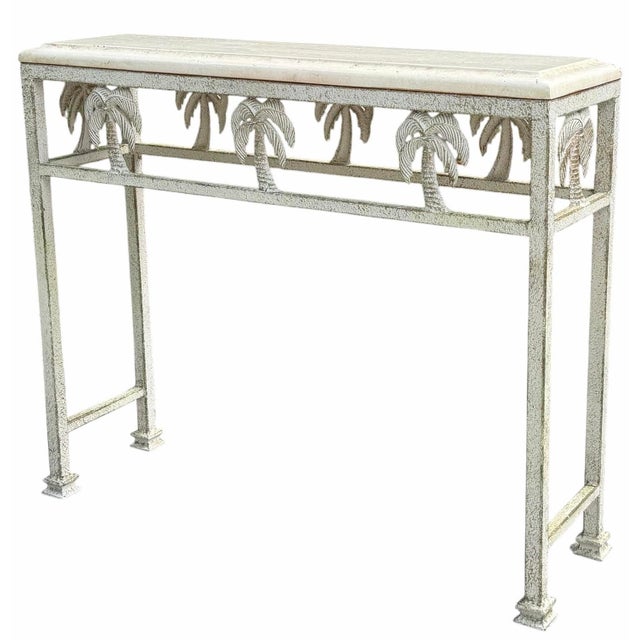 Bring classic Palm Beach style to your home with this vintage console table featuring sculptural palm tree motifs on all...