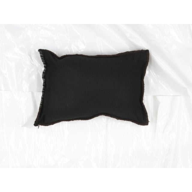 Pillow with genuine hand made antique Persian Bijar rug fragment. Poly fill, fabric backing , sewn closure.