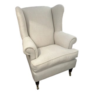 Large Linen Upholstered Wingback Chair on Casters For Sale