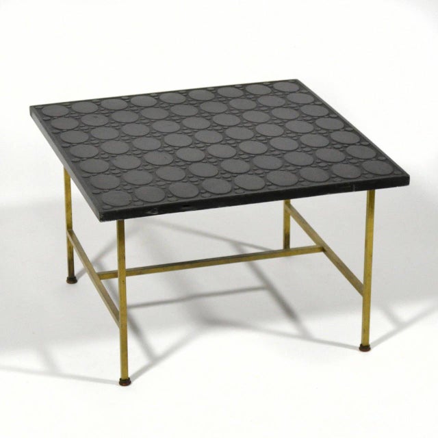 This Paul McCobb side or end table features a brass base and a most unusual top with a wonderful textured pattern. This...