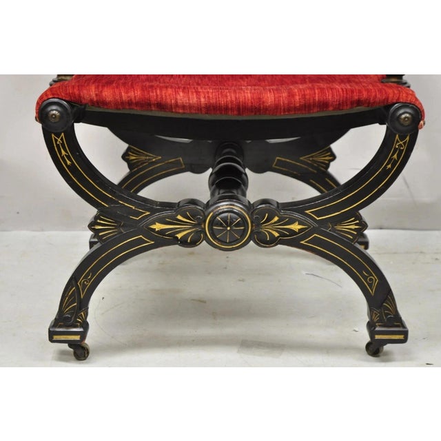 Wood Antique Victorian Aesthetic Movement Ebonized Curule Throne Arm Chair With Lions For Sale - Image 7 of 13
