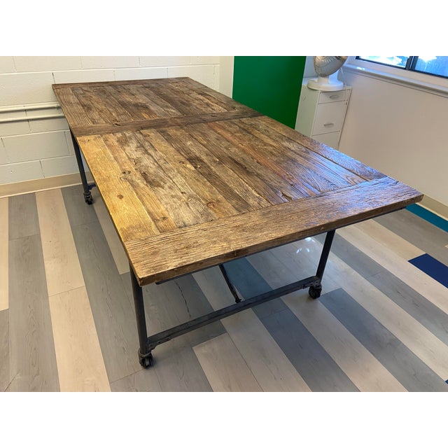 he Restoration Hardware Reclaimed Wood and Iron Dining Table is a stylish and unique addition to any dining room. Made...