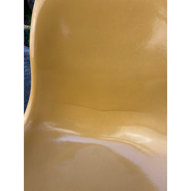 Pair of vintage mid-century modern fiberglass stacking chairs by Howell of St. Charles, Illinois. These classic molded...