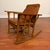 A handsome vintage oak rocking chair with strong Arts & Crafts and Mission style character. This piece features a solid...