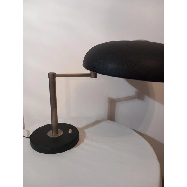 The table lamp is in original condition, the lamp plug may need to be replaced. I have official proof of authenticity such...