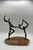 Classic mid century brutalist sculpture of ballet dancers in motion casting great shadow throuhout the day. Piece captures...