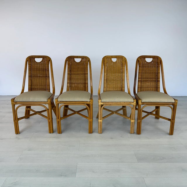 Dimensions: H 37” x W 18.5” x D 22” x SH 20” Set of 4 Dutch Art Nouveau wicker and bamboo dining chairs. Upholstered in...