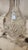 Vintage clear glass decanter with spherical topper. A decanter is a vessel that is used to hold the decantation of a...