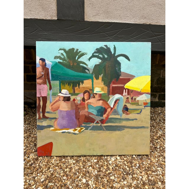 A colorful painting of people hanging out on the beach. I love the composition and in interaction between the figures.