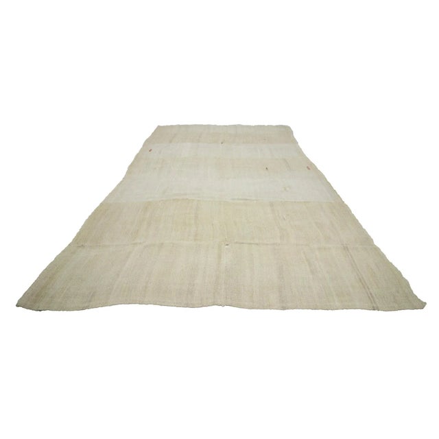 Handwoven vintage hemp kilim rug from Yozgat region of Turkey. Approximately 50-60 years old. In very good condition.