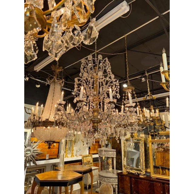 Good 19th century Italian giltwood and beaded crystal chandelier from Geona. Circa 1840. A fine addition to any home!