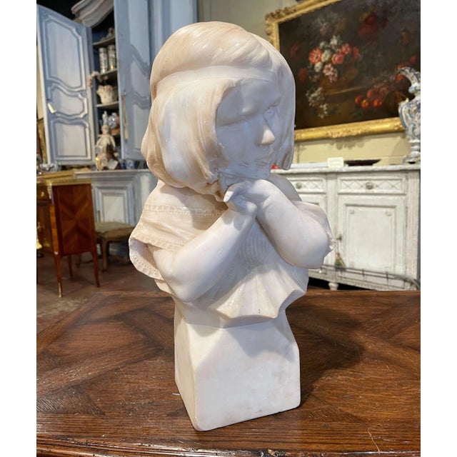 Crafted in France circa 1890, this antique marble bust is a true representation of French elegance. The figural sculpture...