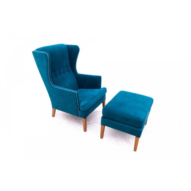 Wingback armchair with ottoman, Denmark, second half of the 20th century. Very good condition. Dimensions: Armchair:...