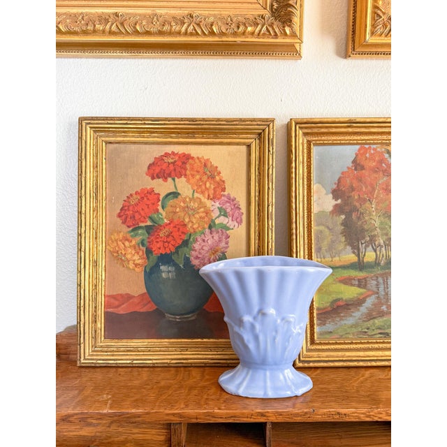 What a lovely periwinkle color! Made by a company like McCoy during the 1930 or 40s, and marked USA on the bottom. Based...