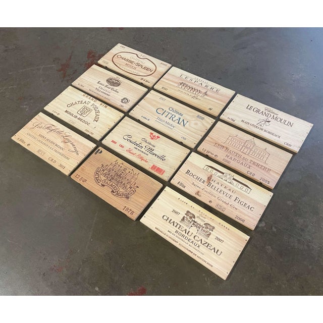 Decorate a wine cellar wall with this set of French wine labels. Crafted in France circa 2000, each wooden label features...