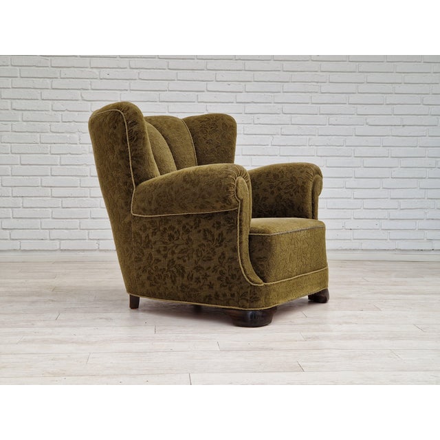 1950s, Danish design. Original relax chair in green fabric. Good condition: no smells and no stains, light wear/ patina on...