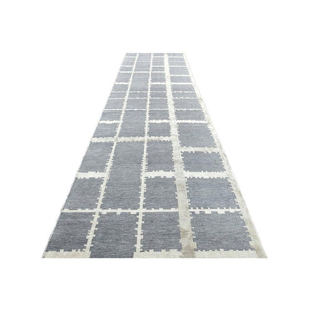 Exact Size: 4'2" x 14'0" Color: Gray Age: New Materials: Wool, Bamboo Silk Construction: Hand Knotted Origin: India