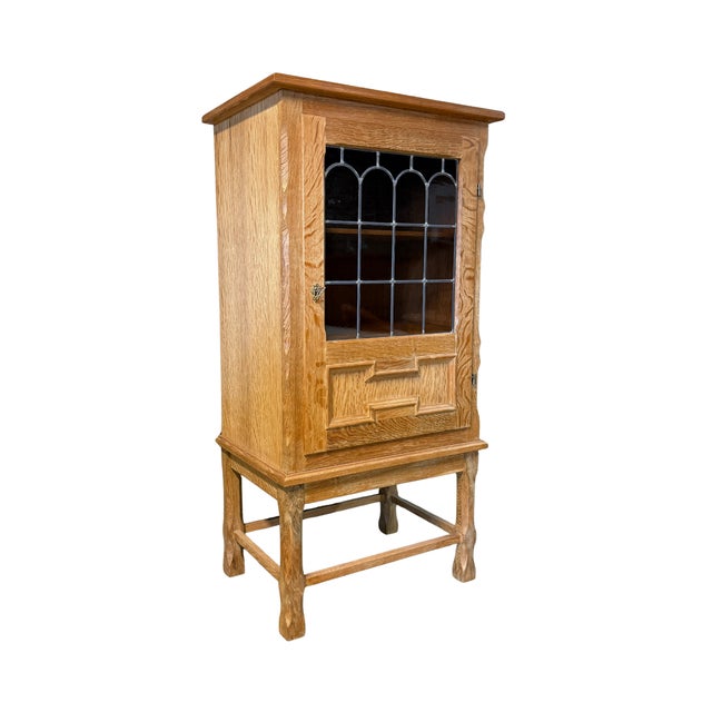Vintage mid-century Danish cupboard in hand-carved and turned white oak attributed to Danish designer Henning Kjærnulf....