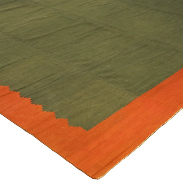 This vintage 15x23 Dhurrie flat weave is an exciting new entry in Rug & Kilim’s esteemed collection. Handwoven in wool, it...