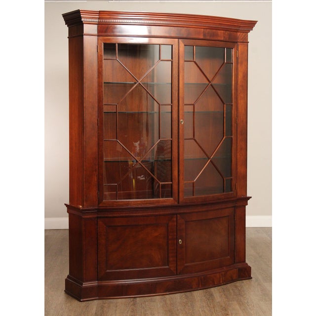 High Quality American Made Large Mahogany Two-Piece China Cabinet Opening to Glass Shelves and Lighted Interior, Key Locking
