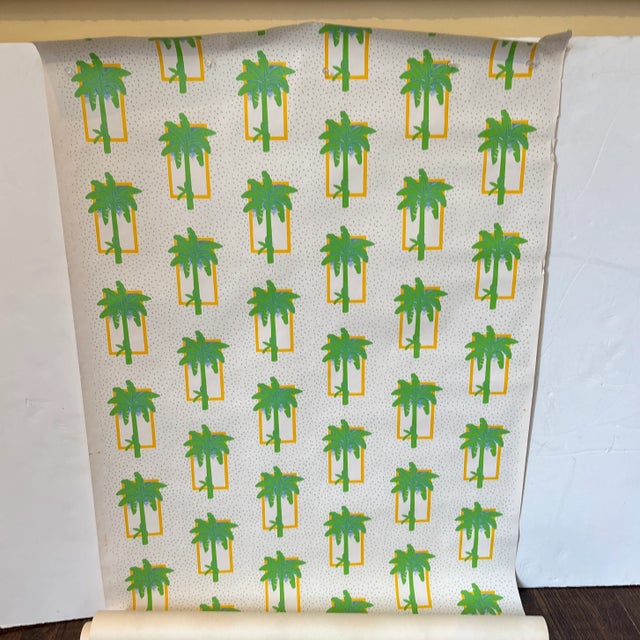 Fun and fabulous wallpaper with bright green and yellow palm tree motif. 17 rolls.