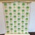 Fun and fabulous wallpaper with bright green and yellow palm tree motif. 17 rolls.