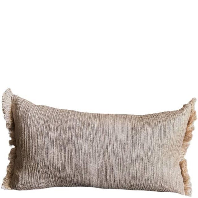 A pillow in our signature style composition, made with a loosely woven linen/cotton blend from Jim Thompson. The irregular...