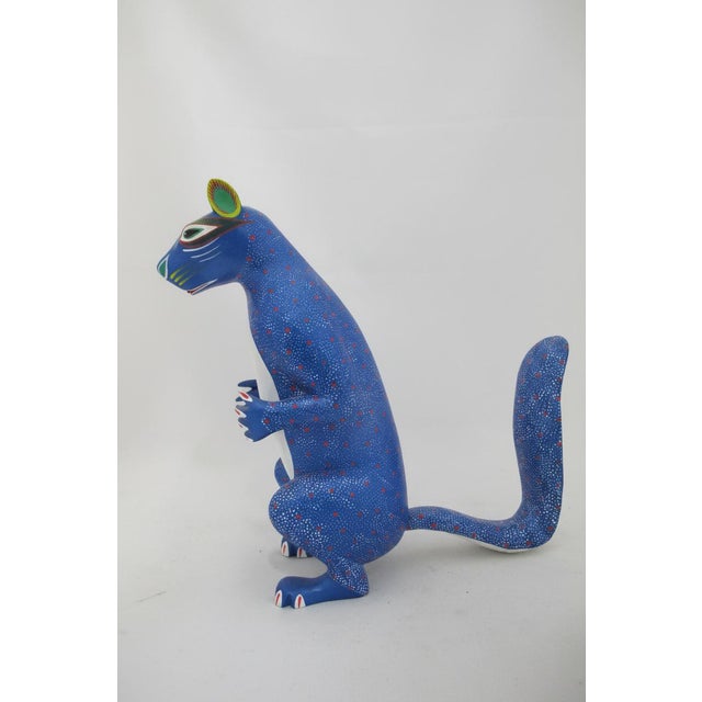 Intricately hand painted wood Squirrel figure, made in Oaxaca, Mexico, traditionally known as Alebrije. Whimsical stylized...