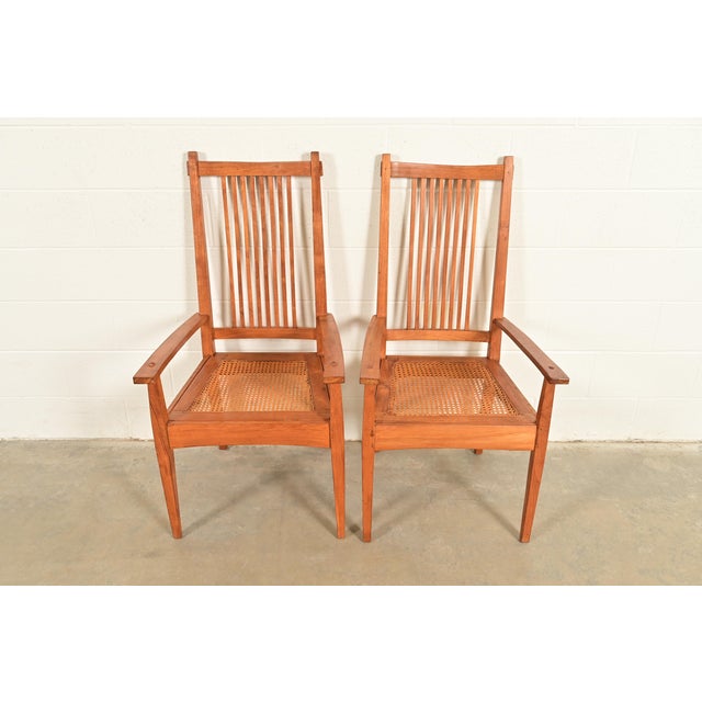 A gorgeous pair of Arts & Crafts or Mission style armchairs or dining captain chairs In the manner of Stickley USA, Circa...