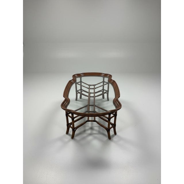 Beautiful large wood coffee table with a scalloped-shaped wood frame and inset glass top. Solid, well-made piece with...