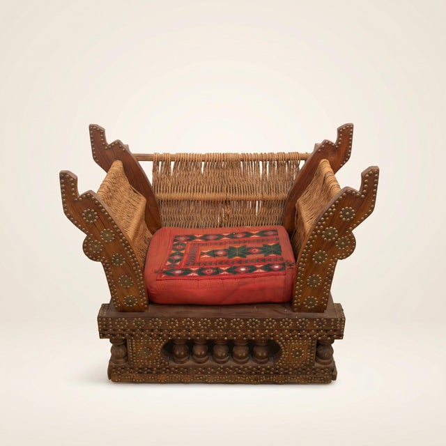 A pair of antique Indian pidha chairs, the low ceremonial seats traditionally made for weddings and dowries in northern...