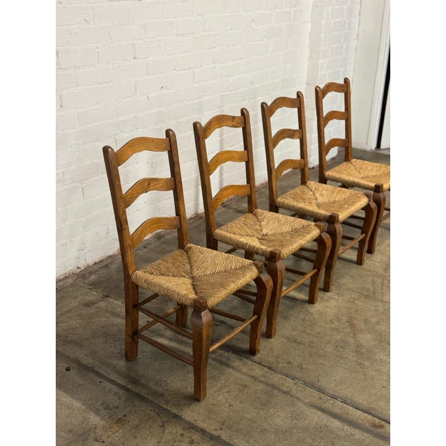 W21 D19 H39 SW17.5 SD16 SH17.5 Vintage dining chairs with woven seats and what seems to be aged pine. Chairs have been...