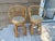 Amazing pair of vintage bohemian rattan swivel stools. The stools feature a latticed backrest.