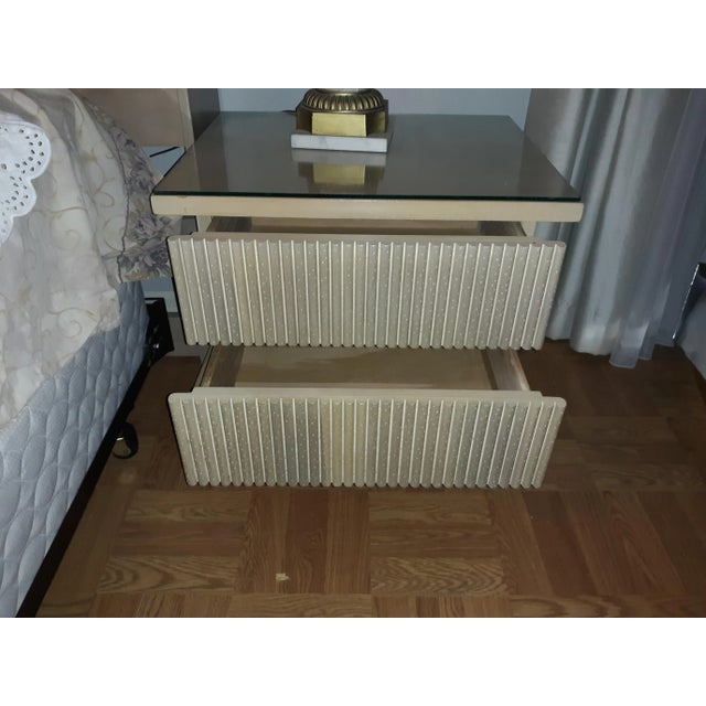 These bedside tables have been used by my grandmother for over 50 years. There has been a glass pane covering the wood so...