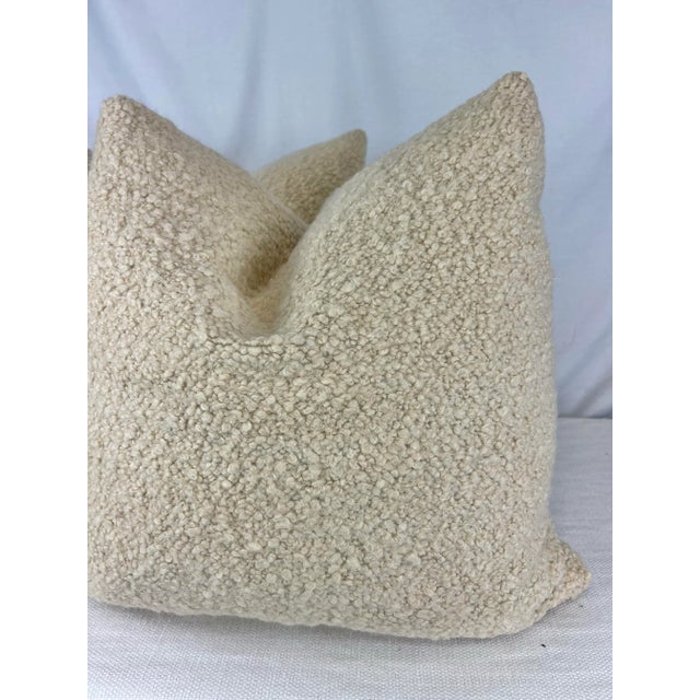 Custom pair of 22" pillows covered in Pindler "Grandeur" in bisque, a boucle fabric. These pillows have tapered corners to...