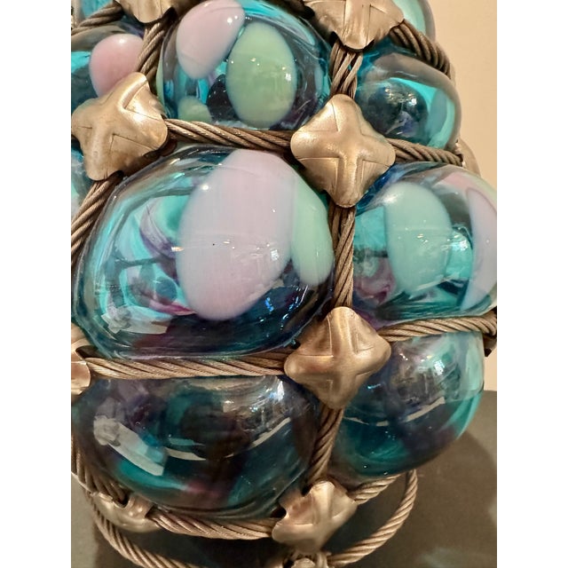 Large hand-blown art glass orb by Bryan Duncan Glass, Florence, Oregon, signed with the studio's anchor seal and dated...