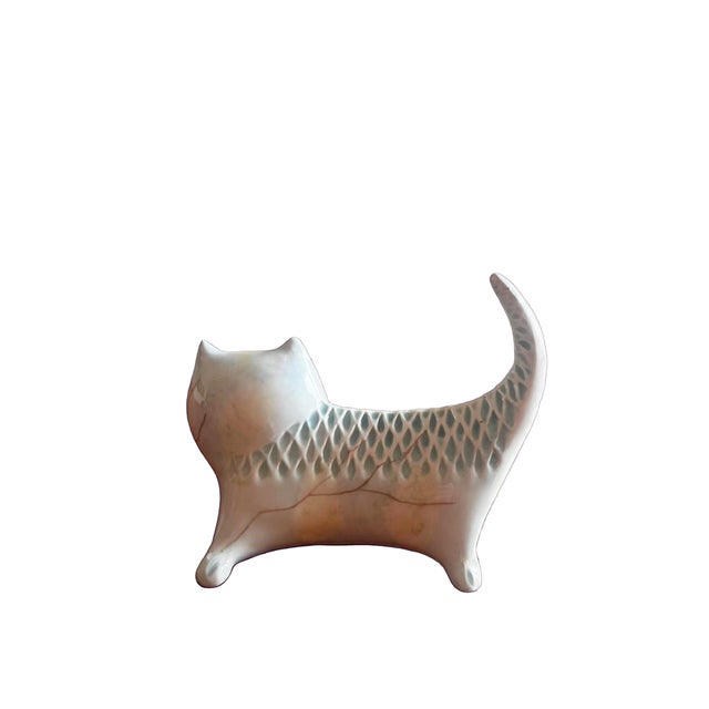 White glazed ceramic cat, Italian artistic production from the 1960s, hand-signed "Muller". Essential, sculptural form:...