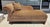 This Leopard Print Upholstered Chaise Lounge features a sweeping rolled arm, generous cushioned seat, and turned wood feet...