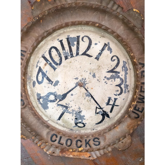 We are selling this great looking advertising trade sign. This sign is cast iron and made in the form of a pocket watch....