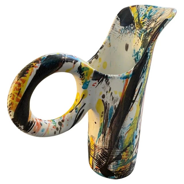 A rare polychrome jug vase hand-crafted and painted by M.Carbone for Ceramica Castelli, the name of decor is Dripping,...