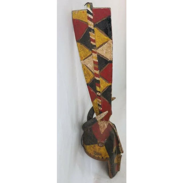 Powerful Primitive Tall African Wood Carved Polychromed Mask For Sale In West Palm - Image 6 of 8