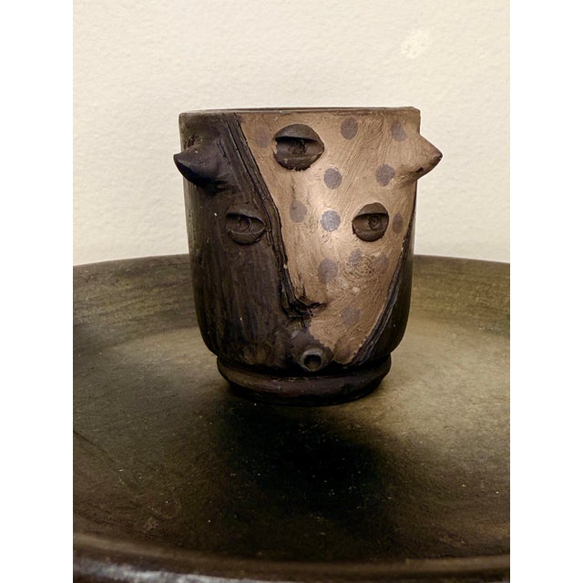 A set of four handmade mezcal glasses and tray from an artisan family in Oaxaca. Finely decorated and painted with various...