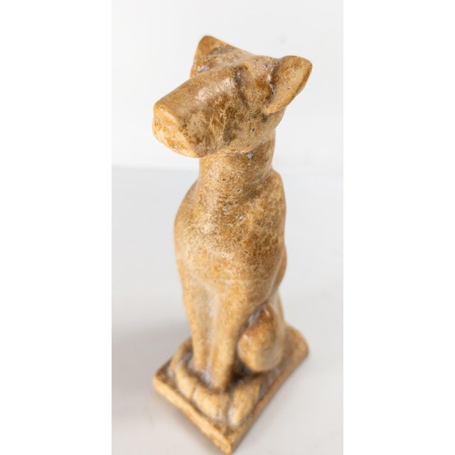 We are selling this great looking Egyptian revival figure of a seated dog. This unusual figure appears to be a jackal or...